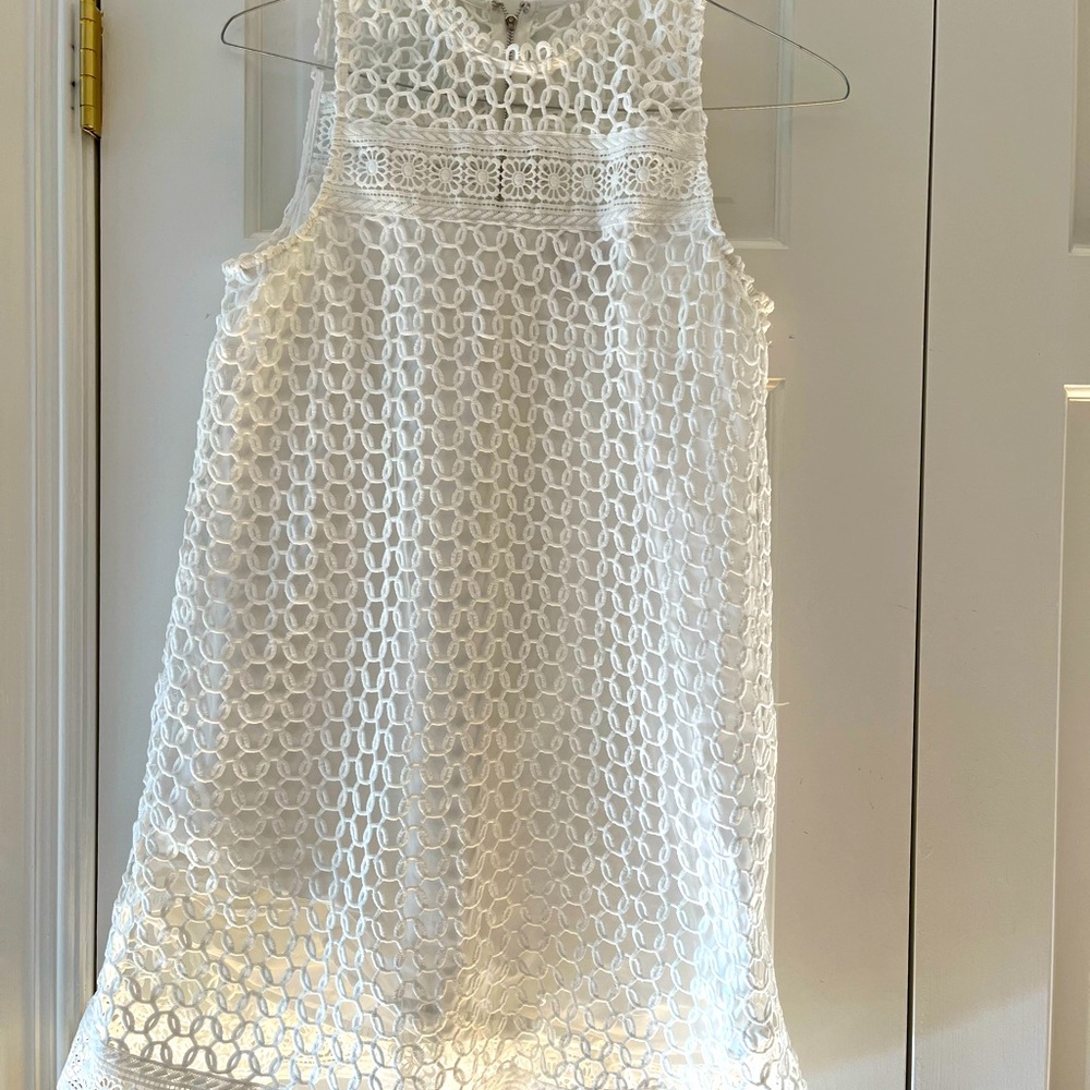 White lined eyelet dress size small.  Excellent condition.